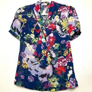 Floral Blouse from GO International. V neck with tie. Sheer Size Medium